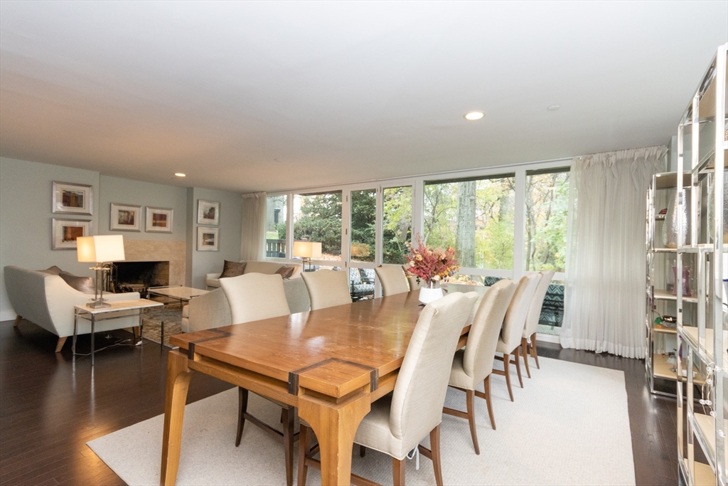 241 Perkins Street, Unit D302 Boston, MA 02130 - Photo 3 of 31 a view of a dining room with furniture window and wooden floor