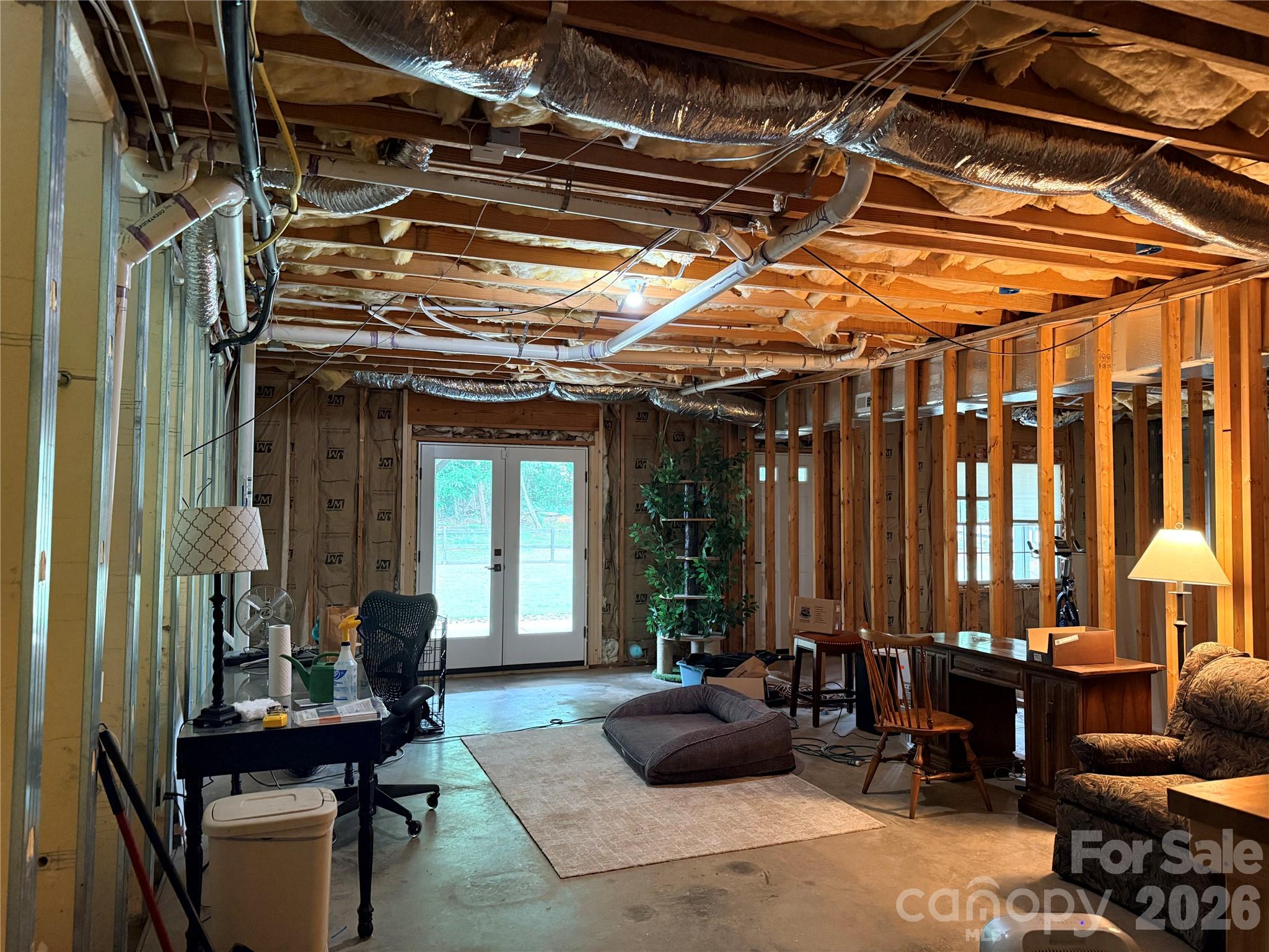 183 Burl Bridges Road Forest City, NC 28043 - Photo 25 of 33 a building outdoor space with patio furniture and potted plants