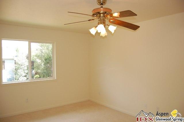 1056 Village Road Carbondale, CO 81623 - Photo 6 of 9 a view of a windows and chandelier fan in a room