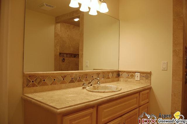 1056 Village Road Carbondale, CO 81623 - Photo 7 of 9 a bathroom with a sink and a mirror