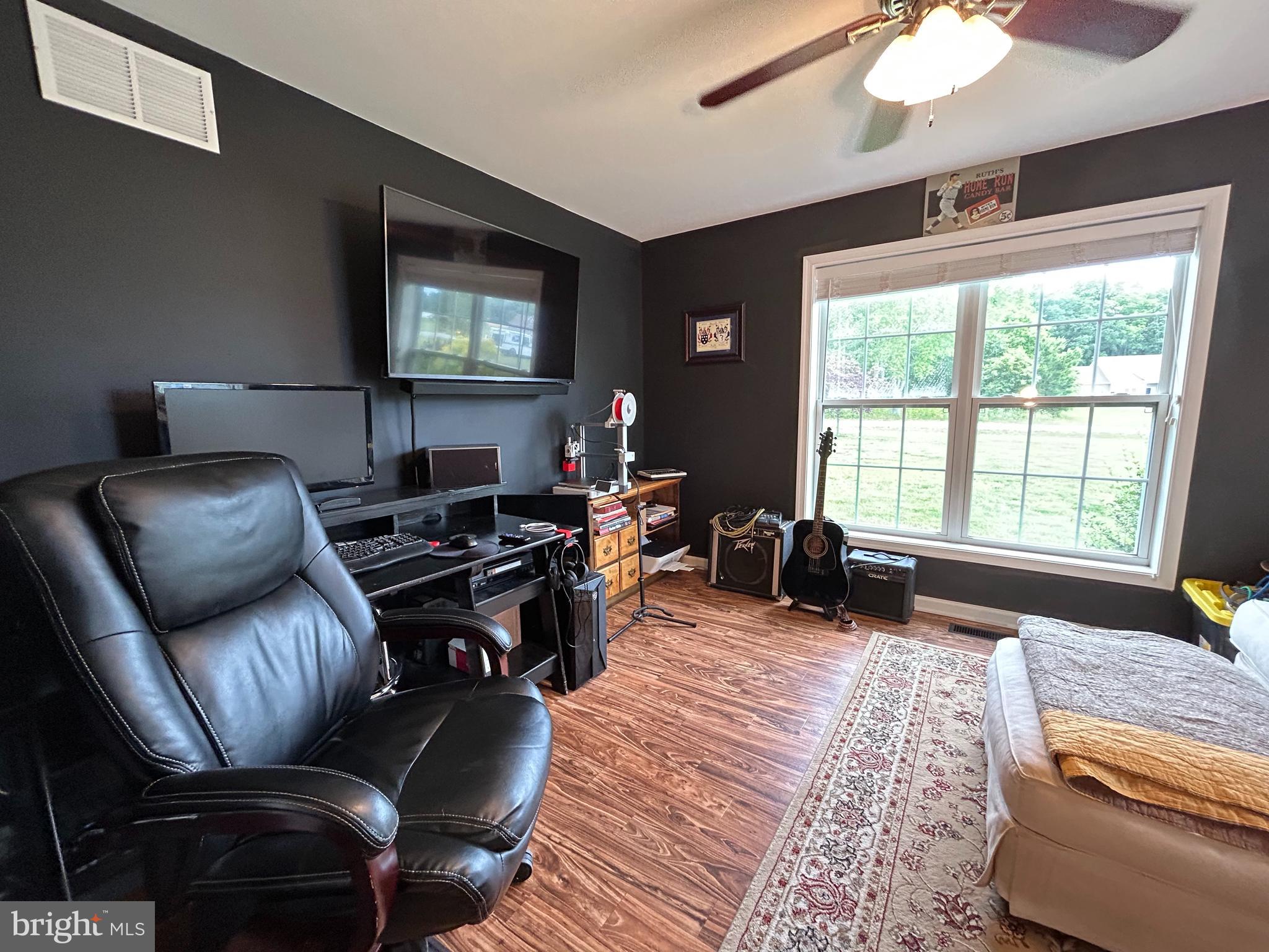20346 Cool Spring Road Milton, DE 19968 - Photo 46 of 69 a living room with furniture and a large window