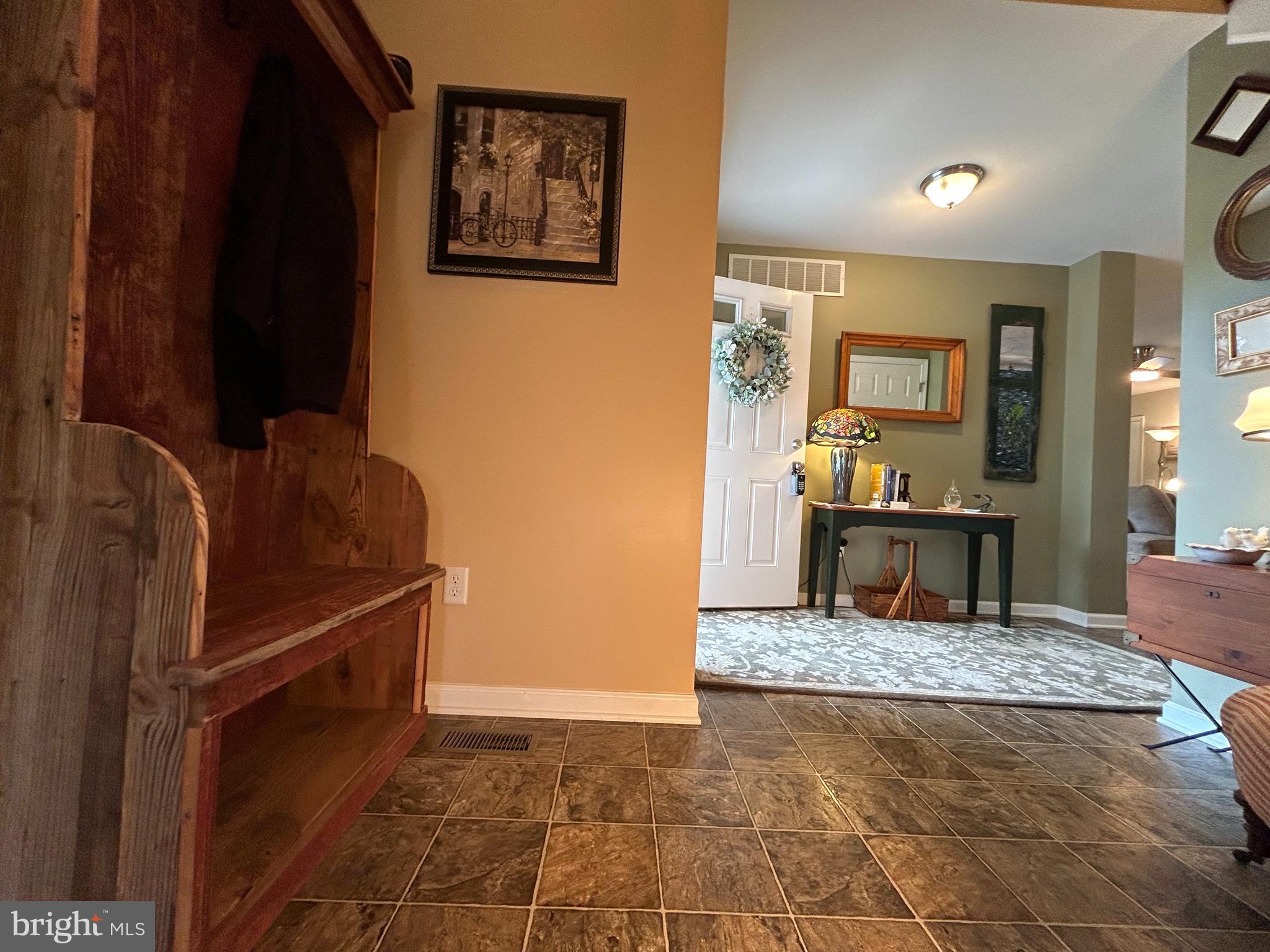 20346 Cool Spring Road Milton, DE 19968 - Photo 56 of 69 a kitchen with granite countertop a refrigerator and a stove