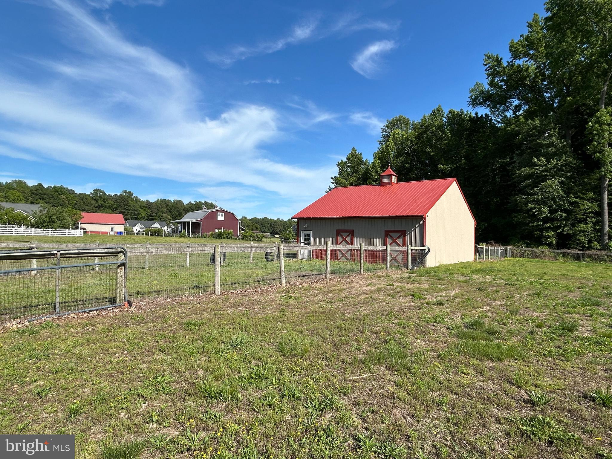 20346 Cool Spring Road Milton, DE 19968 - Photo 10 of 69 a backyard of a house with table and chairs