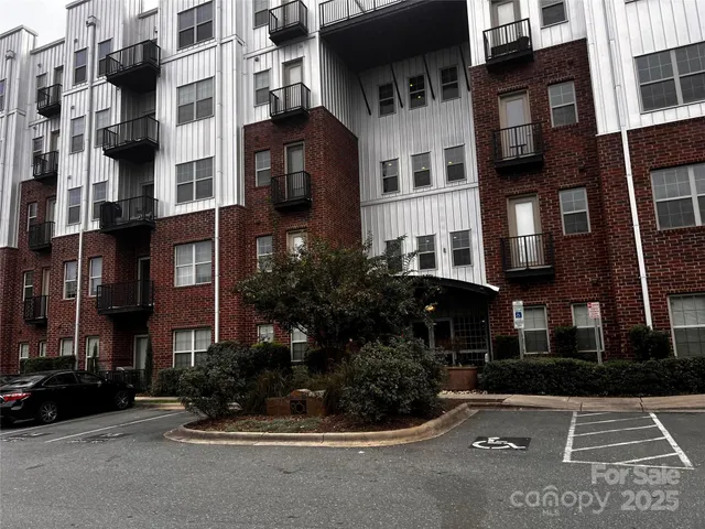 a view of street with tall buildings