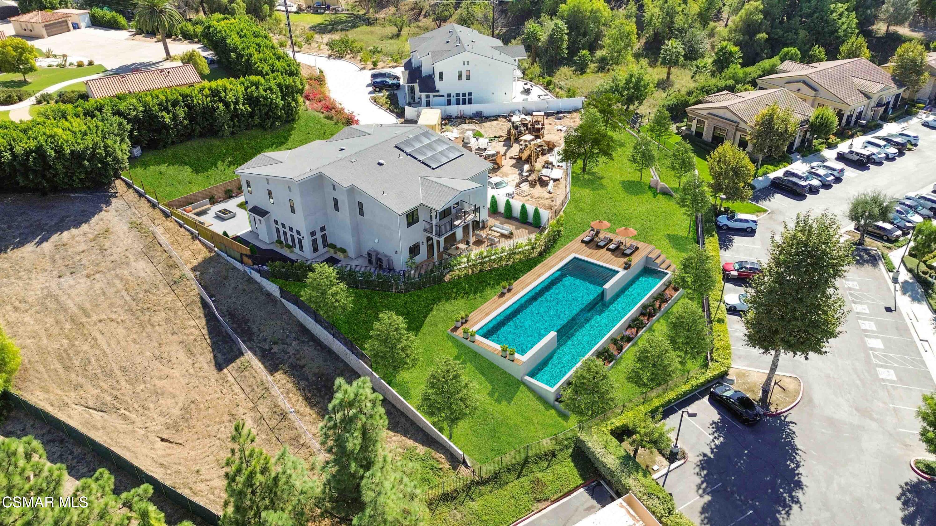 252 Capri Drive Simi Valley, CA 93065 - Photo 12 of 15 an aerial view of a house with a garden and lake view