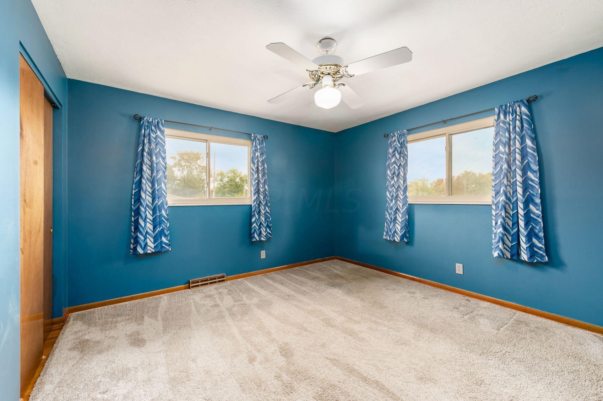 5355 Karl Road Columbus, OH 43229 - Photo 25 of 39 BEDROOM 2 WITH HARDWOOD FLOORS UNDER CARPET