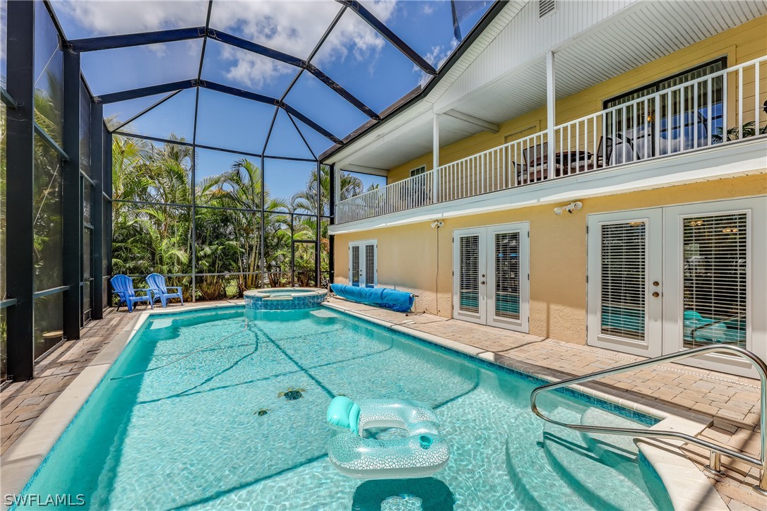 2885 Triggerfish Street Cape Coral, FL 33993 - Photo 16 of 35 a view of a house with backyard