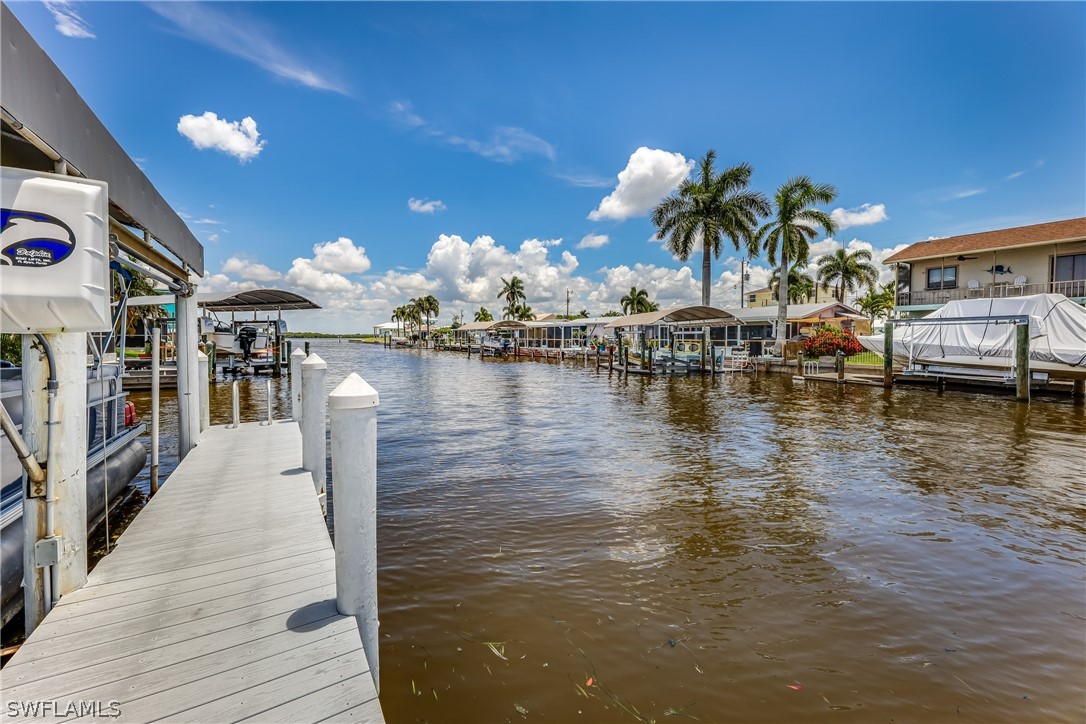 2885 Triggerfish Street Cape Coral, FL 33993 - Photo 20 of 35 a view of a house with swimming pool