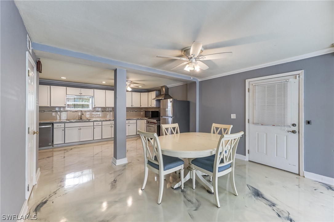 2885 Triggerfish Street Cape Coral, FL 33993 - Photo 8 of 35 a view of a dining room and livingroom view