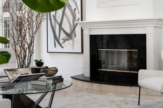 a view of a dining room with furniture and window