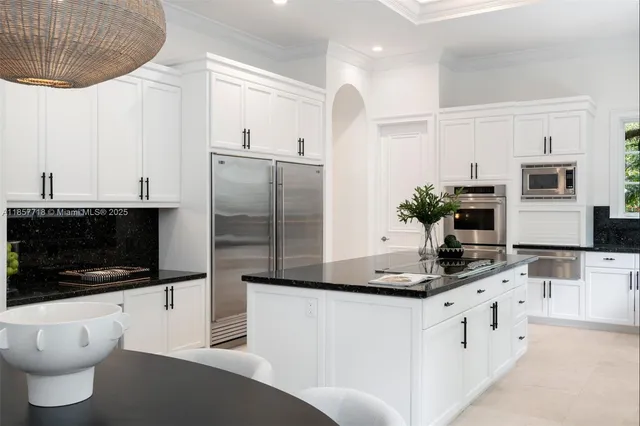 a spacious bedroom with a bed a couch and a couch