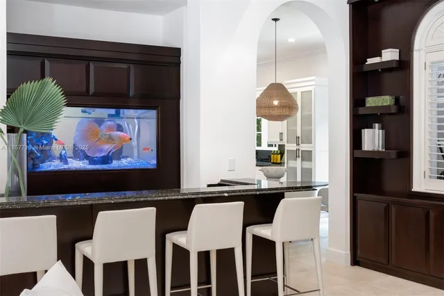 a view of a livingroom with stairs