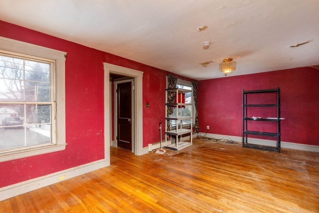 4 Capitol Street Methuen, MA 01844 - Photo 5 of 12 a room with furniture and windows