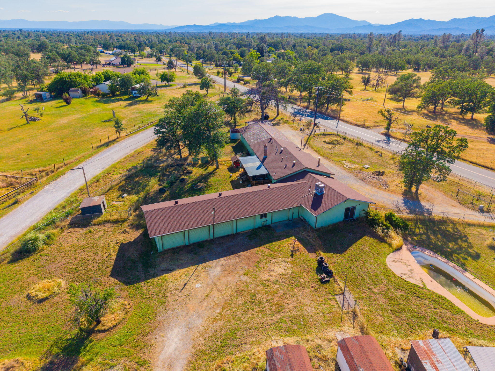 22189 Old Alturas Road Redding, CA 96003 - Photo 65 of 70 an aerial view of residential houses with outdoor space