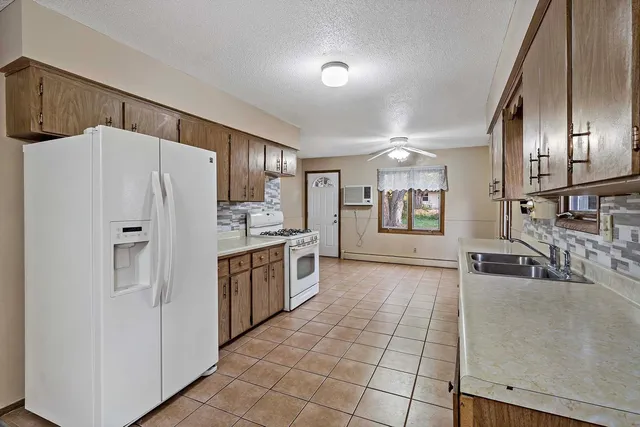 $410,000 | 13940 64th Avenue North, Maple Grove, MN 55311