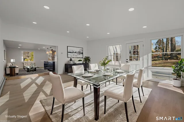 a view of a dining room with furniture