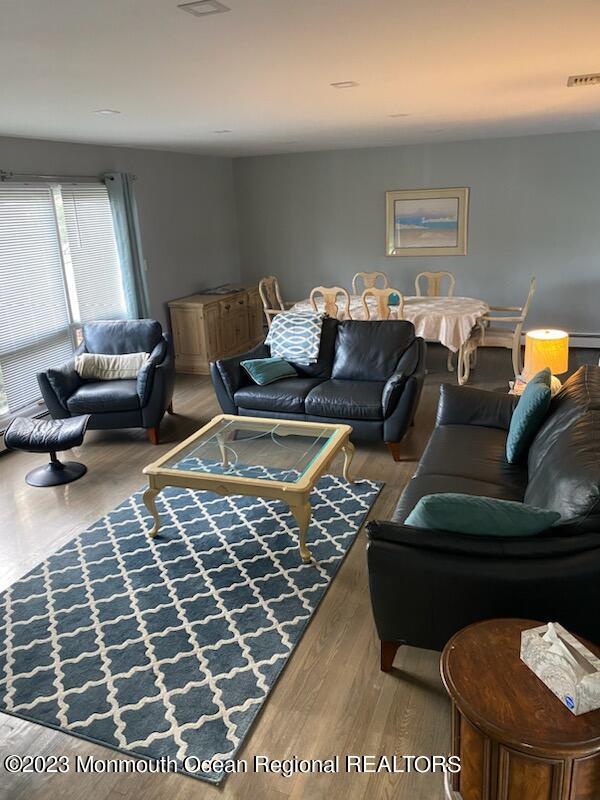 293 Lawrence Avenue Oakhurst, NJ 07755 - Photo 11 of 18 a living room with furniture