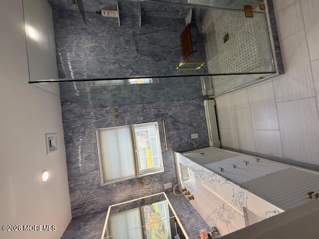 293 Lawrence Avenue Oakhurst, NJ 07755 - Photo 18 of 18 a bathroom with a sink a vanity and mirror