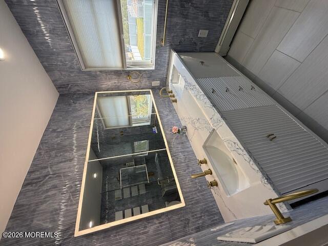 293 Lawrence Avenue Oakhurst, NJ 07755 - Photo 5 of 18 a front view of a house with wooden floor