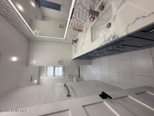 293 Lawrence Avenue Oakhurst, NJ 07755 - Photo 6 of 18 a kitchen with a sink and cabinets