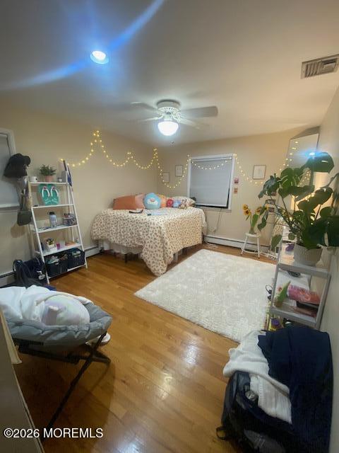 293 Lawrence Avenue Oakhurst, NJ 07755 - Photo 10 of 18 a living room with furniture and a flat screen tv