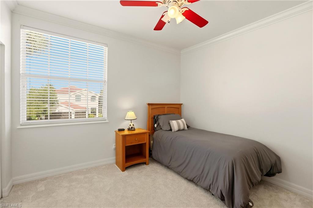 2150 Khasia Point Naples, FL 34119 - Photo 15 of 39 Carpeted bedroom featuring ornamental molding and a ceiling fan
