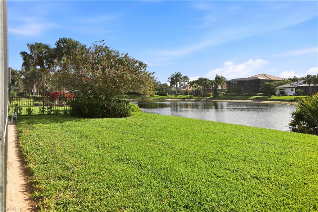 2150 Khasia Point Naples, FL 34119 - Photo 23 of 39 View of yard featuring a water view