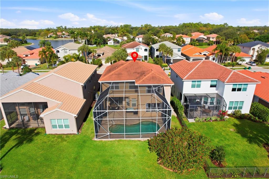 2150 Khasia Point Naples, FL 34119 - Photo 30 of 39 Aerial perspective of suburban area with a pool