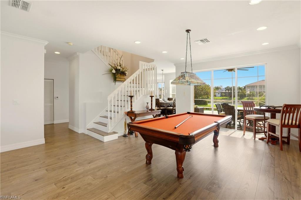 2150 Khasia Point Naples, FL 34119 - Photo 4 of 39 Rec room featuring light wood-style flooring, billiards table, ornamental molding, and recessed lighting