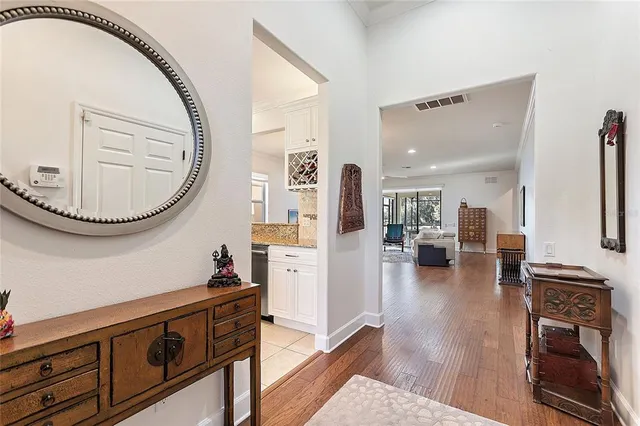 a view of a livingroom with furniture and wooden floor