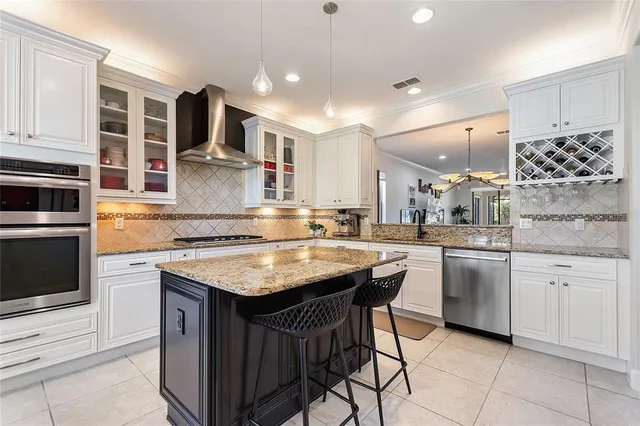 a bedroom with a bed and a table