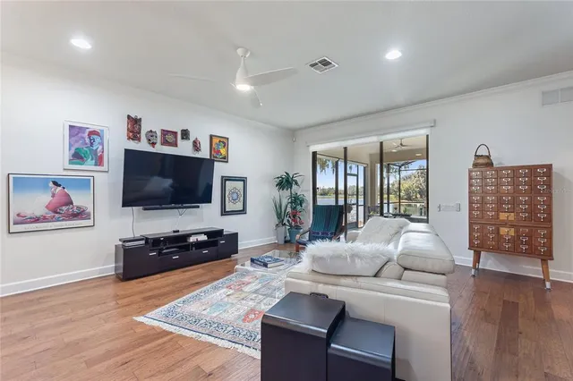 a spacious bathroom with a granite countertop sink mirror and shower