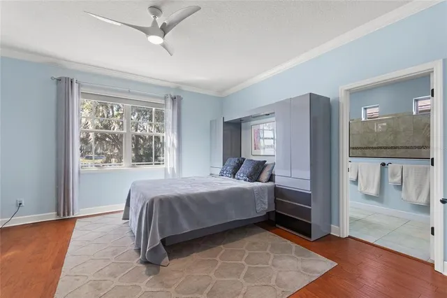 an aerial view of a houses with a lake view