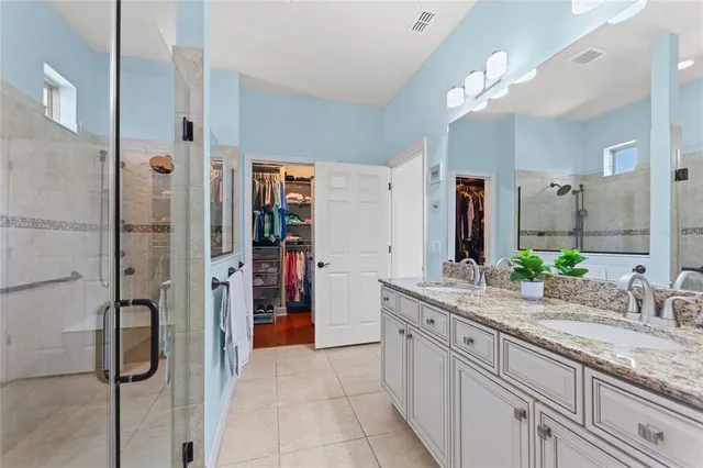 a view of a swimming pool with a patio