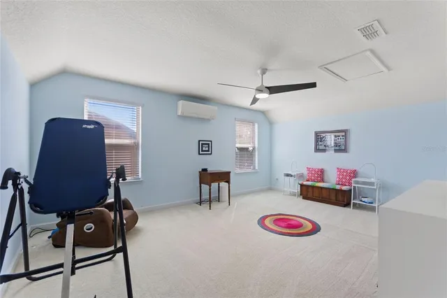 a view of a swimming pool with a table and chairs