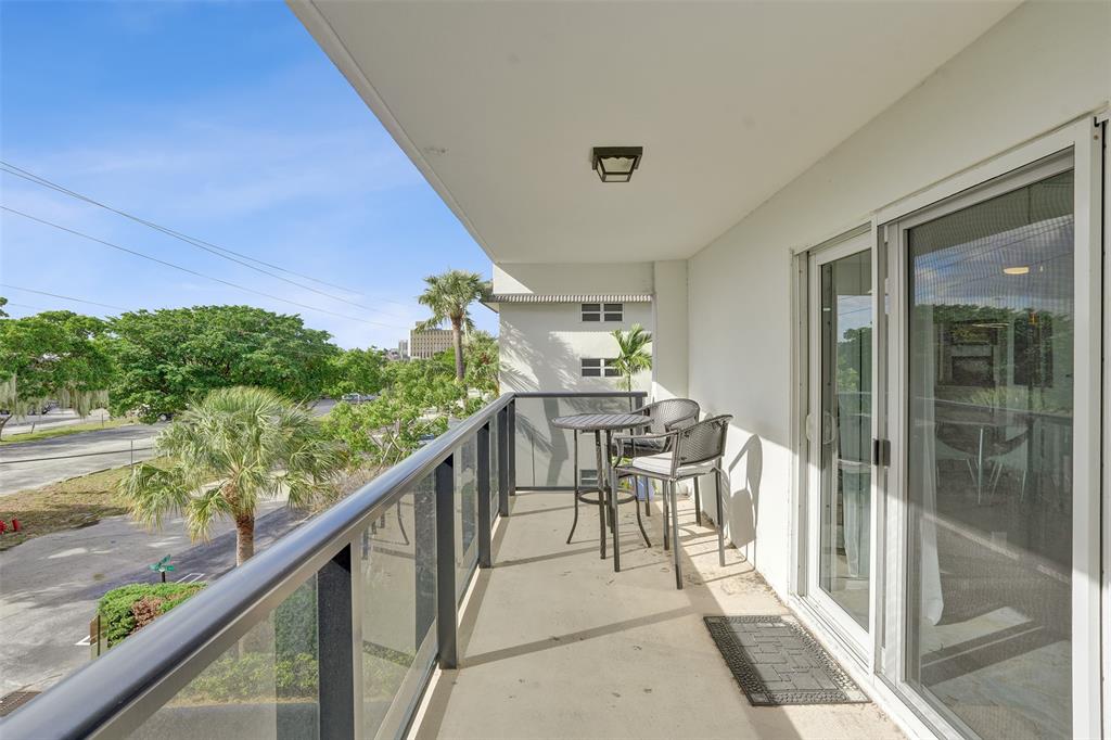 5100 Dupont Boulevard, Unit 3G Fort Lauderdale, FL 33308 - Photo 11 of 46 a balcony with chairs and an outdoor view
