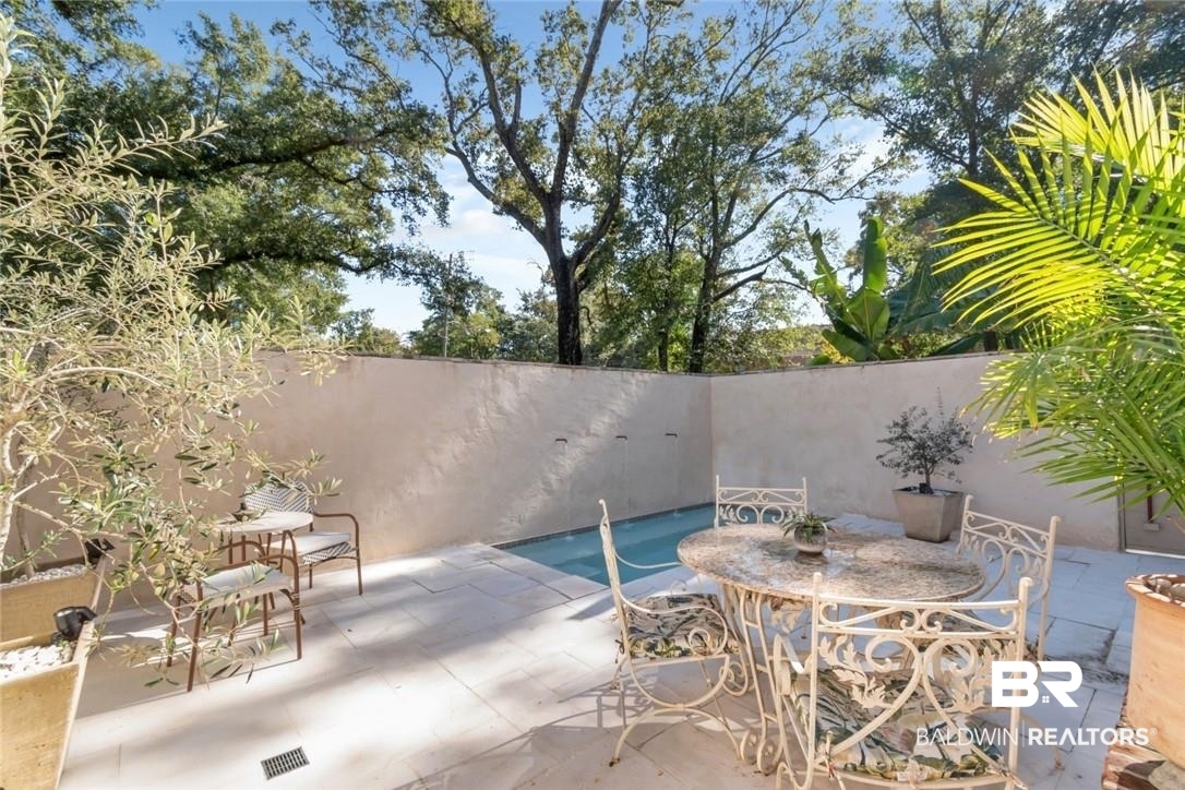 5200 Border Drive South Mobile, AL 36608 - Photo 9 of 26 View of swimming pool featuring a patio area