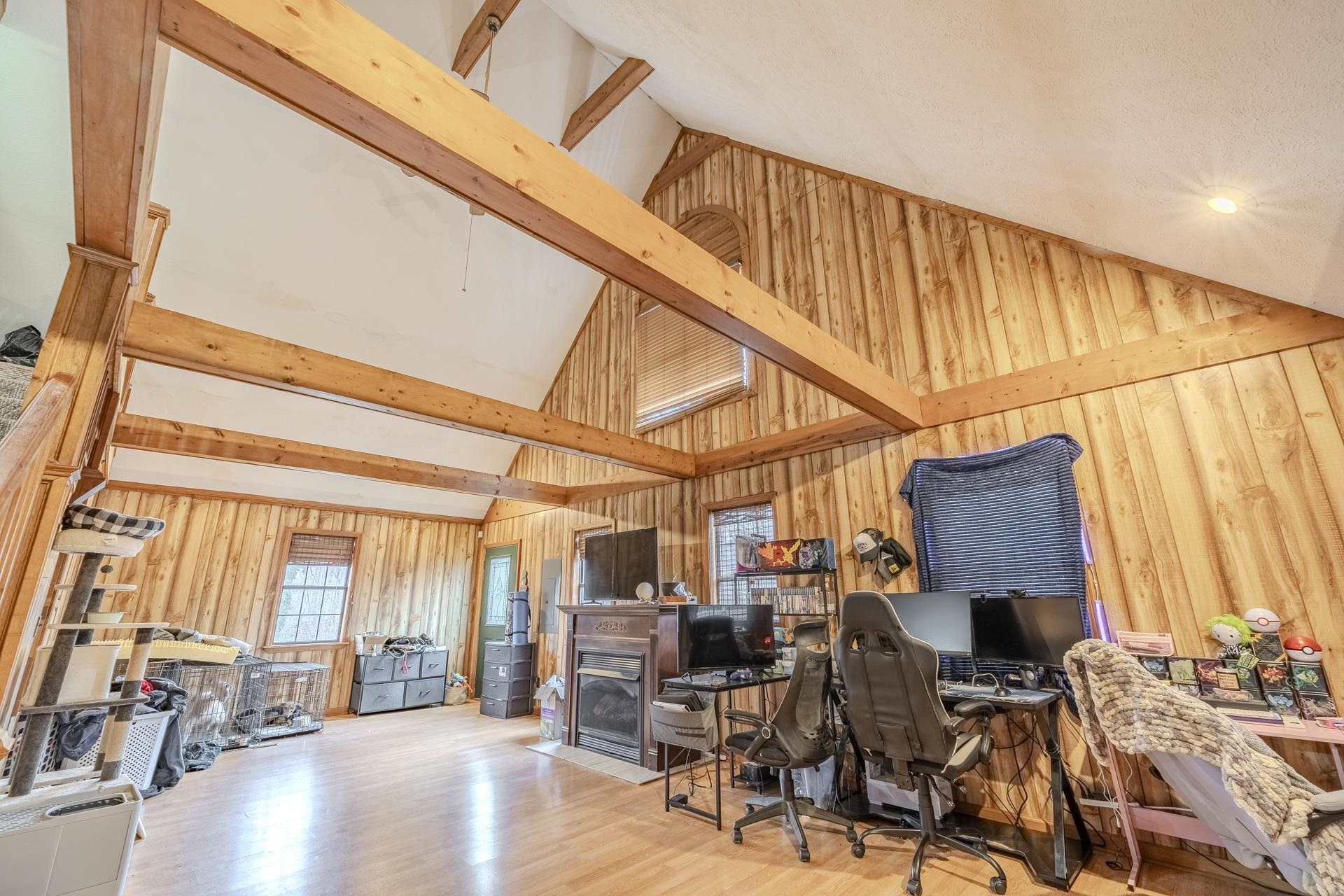 635 Pompeys Branch Road Savannah, TN 38372 - Photo 11 of 26 Home office with vaulted ceiling, wood walls, and light wood finished floors