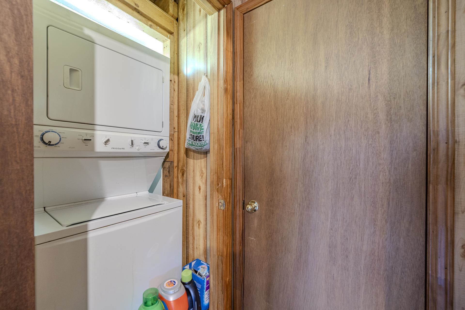 635 Pompeys Branch Road Savannah, TN 38372 - Photo 14 of 26 Laundry area with stacked washer and dryer