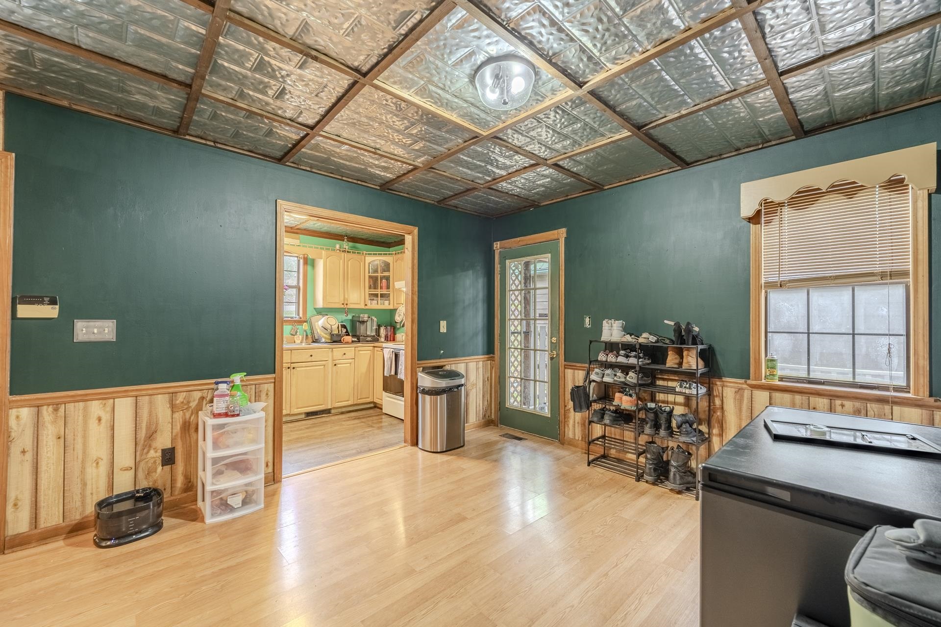 635 Pompeys Branch Road Savannah, TN 38372 - Photo 22 of 26 Office area with an ornate ceiling, wood walls, light wood finished floors, and a wainscoted wall
