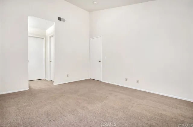 an empty room with an entryway