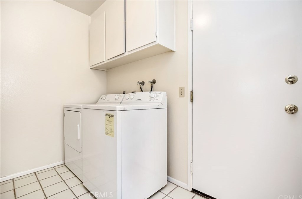 341 Stanford Court, Unit 26 Irvine, CA 92612 - Photo 17 of 24 a utility room with dryer and washer