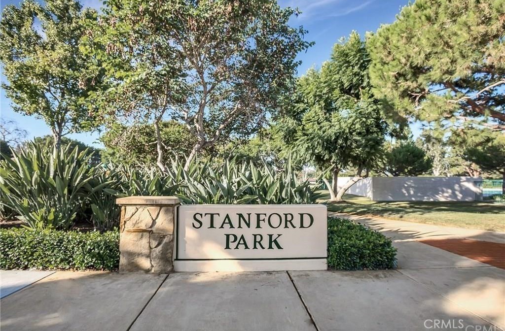 341 Stanford Court, Unit 26 Irvine, CA 92612 - Photo 19 of 24 a sign that is on the side of a road