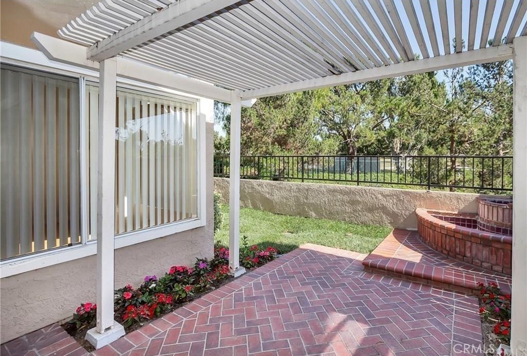 341 Stanford Court, Unit 26 Irvine, CA 92612 - Photo 20 of 24 a view of a back yard from a patio