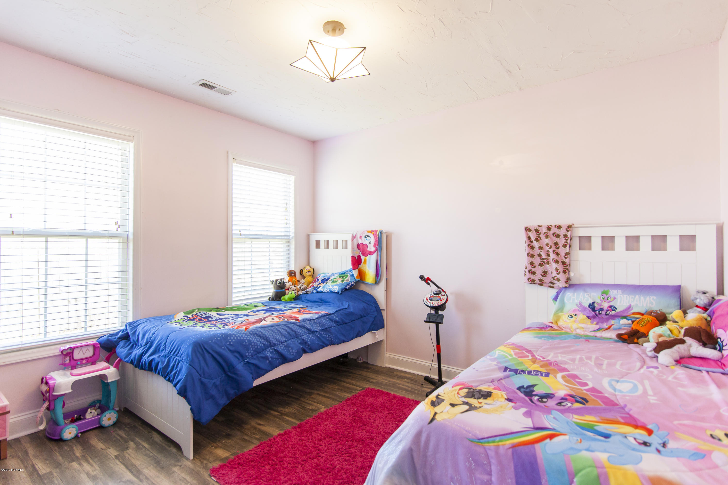304 Conner Grant Road New Bern, NC 28562 - Photo 23 of 26 304 Bedroom Two Beds & Window