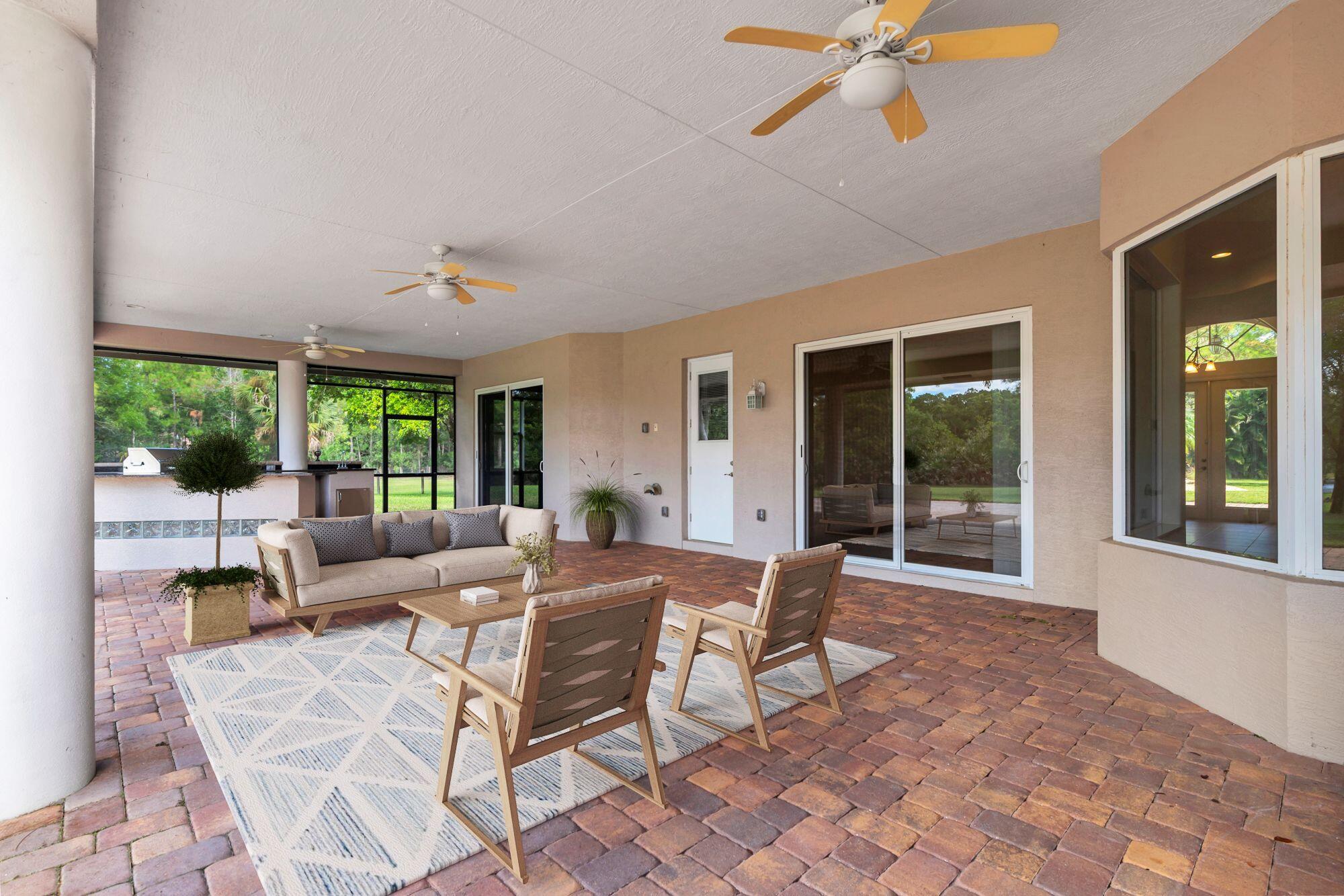 13095 Sand Ridge Road Palm Beach Gardens, FL 33418 - Photo 33 of 55 Virtually Staged Lanai