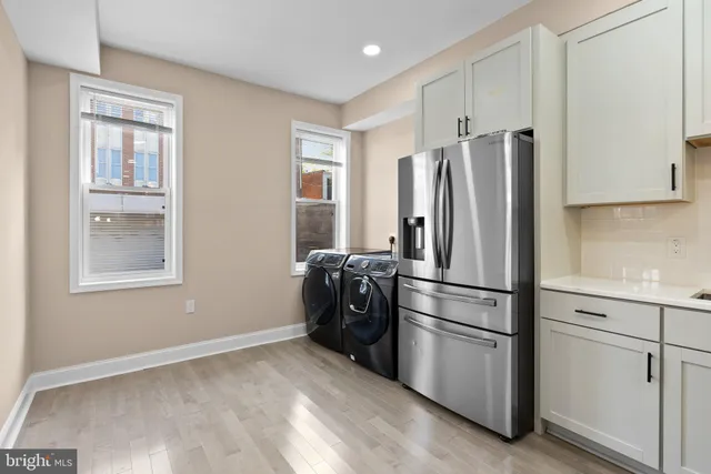 a bathroom with a sink and mirror