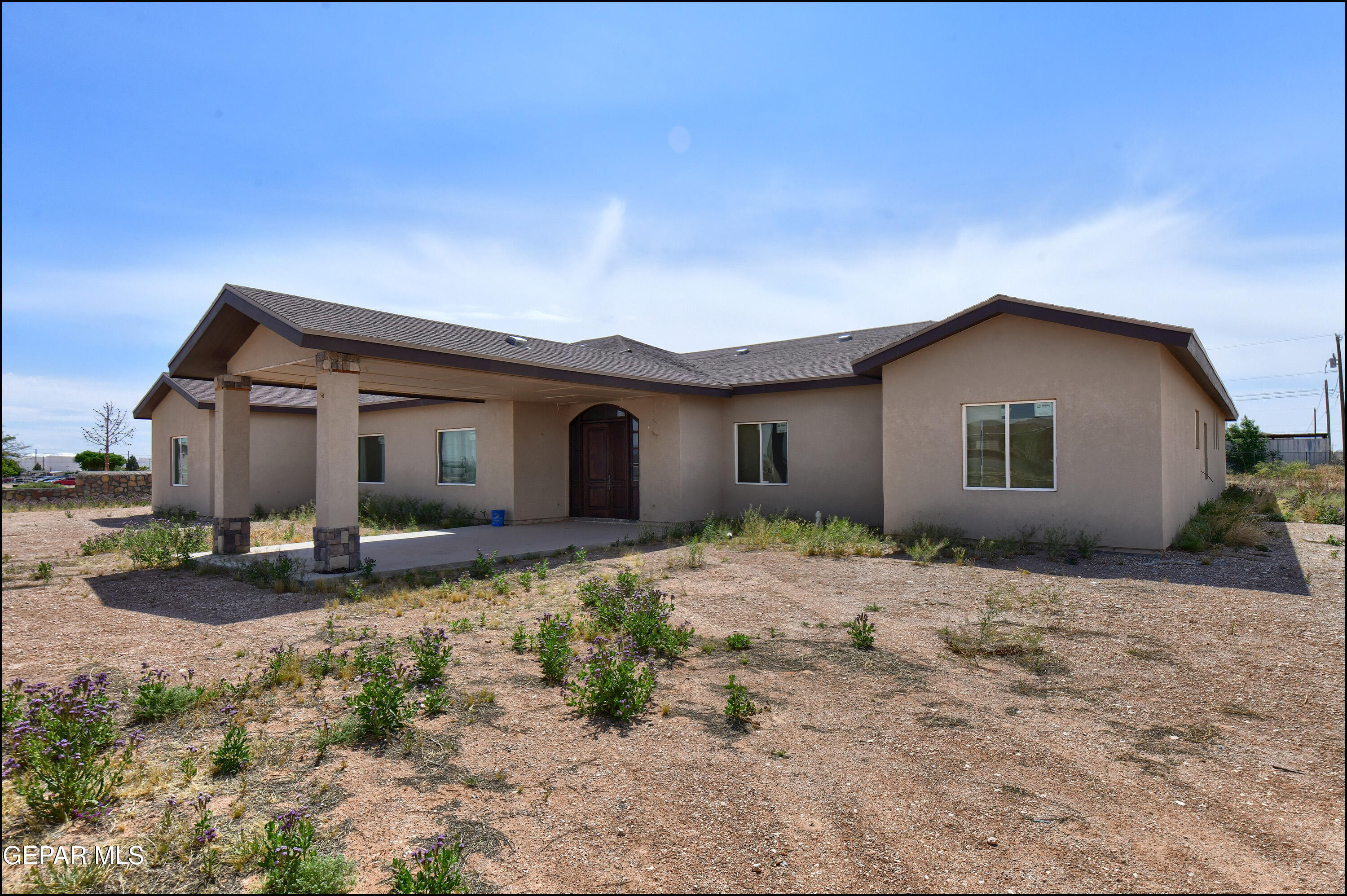 13360 Ayla Road El Paso, TX 79938 - Photo 1 of 48 a view of a house with backyard