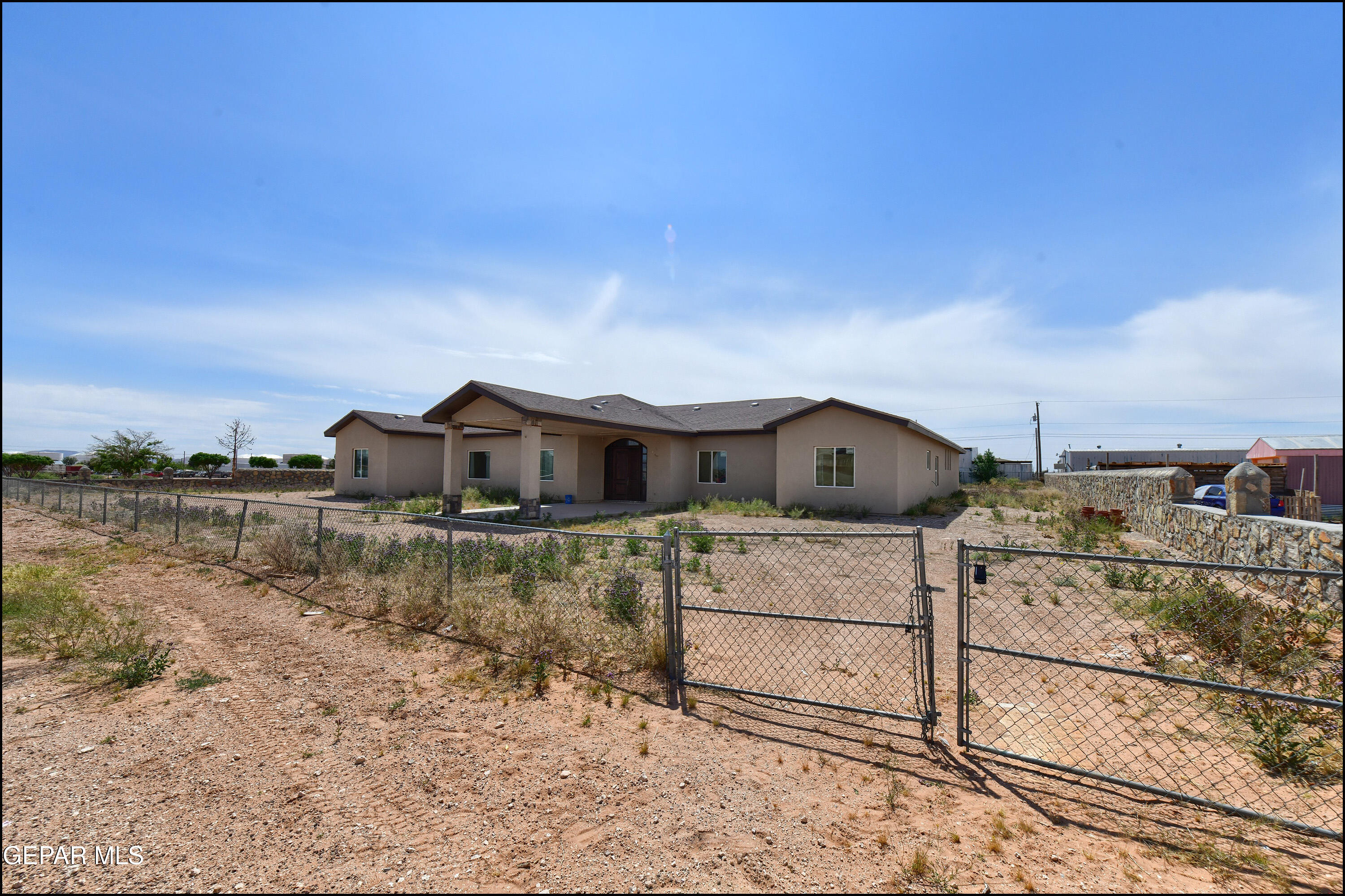 13360 Ayla Road El Paso, TX 79938 - Photo 2 of 48 a view of a house with a yard