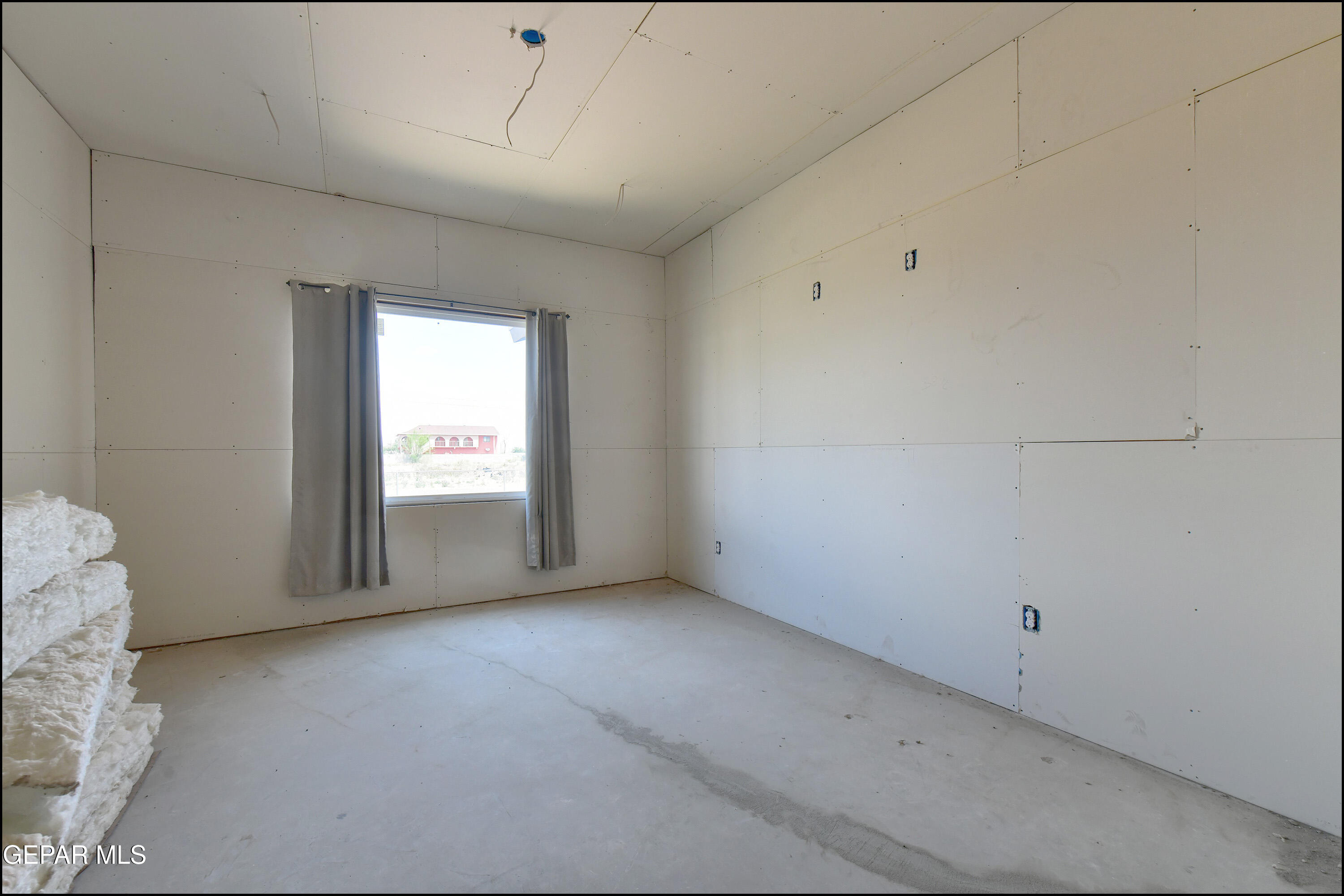 13360 Ayla Road El Paso, TX 79938 - Photo 22 of 48 a view of empty room with window